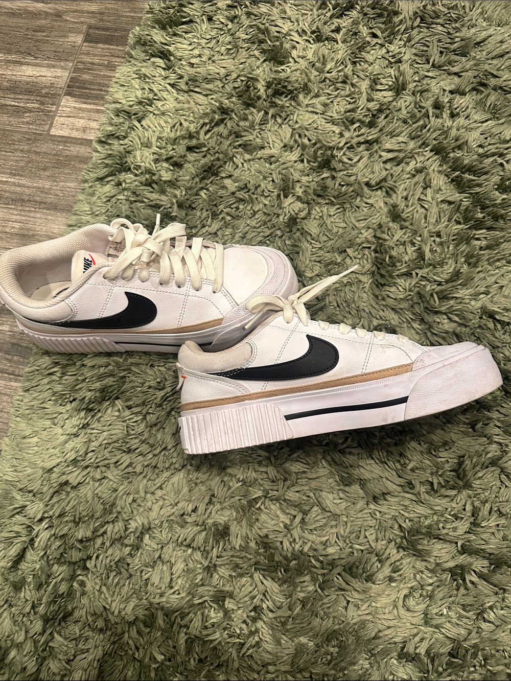 Nike Women’s White Sneakers with Black Swoosh and Tan Stripe